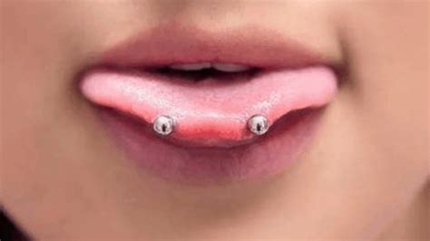 Snake eye tongue piercing: risks, pain & pros